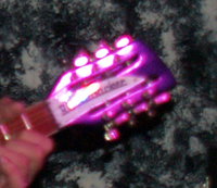 P6307905_cr  headstock purple glow.jpg