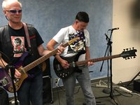 When they write the book of "cool" this will be one of the pages .--- the 8-Stringer "S" basses wail on in unison.....
