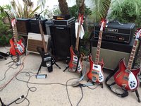 Paulie's Big Red on the left, Joey's JetGlo Set Neck with a RIHS pickup, Joey's classic 4001 and Rich's 4003 FG with flatwounds and the Snowman's customized 330 WB with the Paul W deep red FG finish