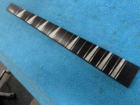 Finished fretboard, with Dressed Guitar Frets onboard