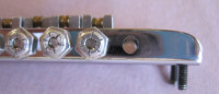 Screw hole elongated to accommodate screw