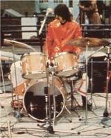 Ringo also removed his front drum head and placed a blanket inside the shell. It was reported that a special sweater with eight sleeves was used early on. Note: The movie Help was originally to be called Eight Arms To Hold You. This sweater was made for the film and disgarded only to be used as a bass drum muffler.