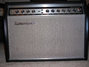 Rickenbacker TR100/amp , Black: Headstock