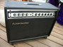 Rickenbacker TR100/amp , Black: Headstock