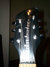 Rickenbacker 650/6 Colorado, Jetglo: Headstock