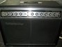 Rickenbacker TR100/amp , Black: Headstock