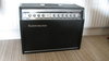 Rickenbacker TR100/amp , Black: Headstock