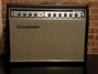 Rickenbacker TR100/amp , Black: Headstock